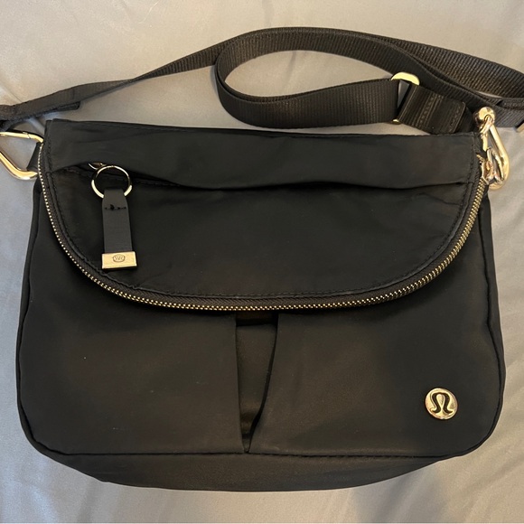 lululemon athletica Handbags - Lululemon All Night Festival Bag Black/Gold 5L